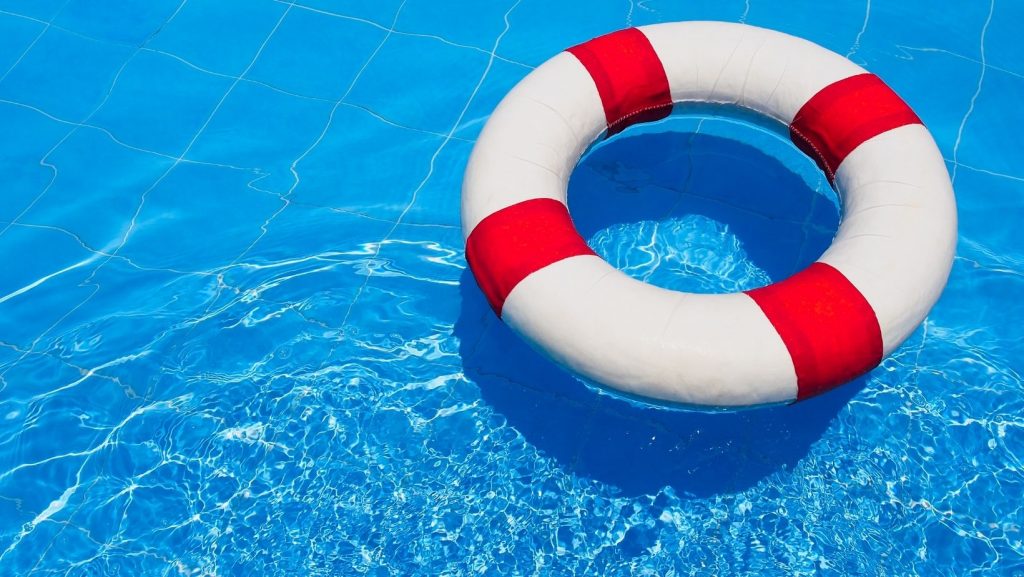 water rescue ring floating in pool
